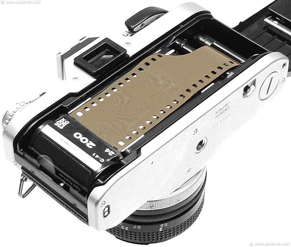 Canon AV-1 Loading Film Large Image